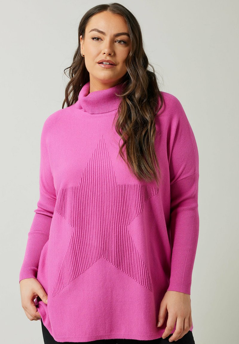 Maglione a collo alto rosa con un grande motivo a stella testurizzato al centro. Tessuto morbido a maglia con maniche lunghe e vestibilità comoda.