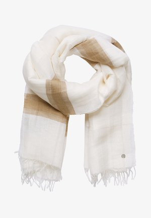 Écharpe blanche douce avec de larges rayures beige et des franges aux extrémités, pliée en boucle lâche, comportant une petite étiquette logo métallique à une extrémité.