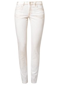 Ljusbeige denimjeans med slim fit, fem fickor och en enkel knappstängning. Diskret bleknande och sömnadsdetaljer.