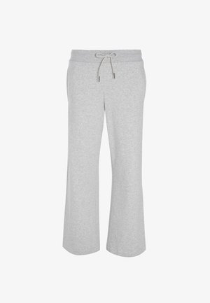 Pantalones deportivos grises, ajustados y cónicos, hechos de tela suave con una cintura elástica y cordón ajustable. Cuenta con dos bolsillos laterales.