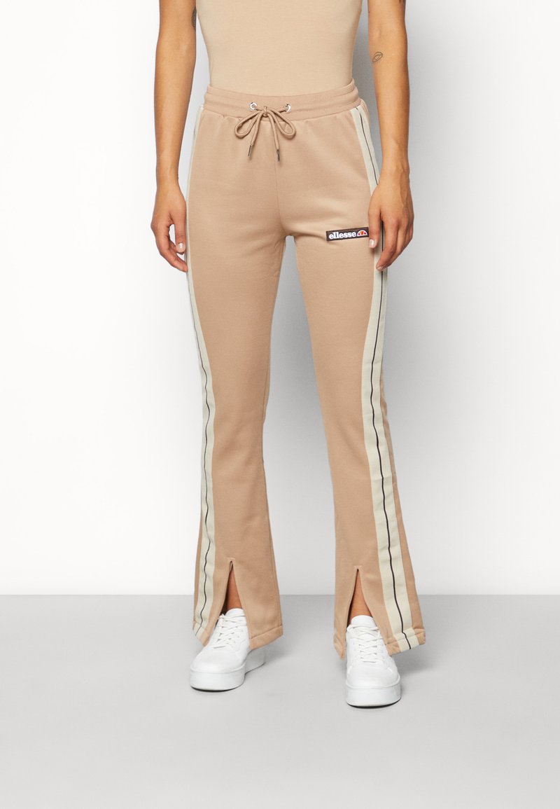Ellesse EVELIN FLARED Tracksuit bottoms light brown/beige Zalando