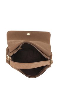 Brown suede handbag with a smooth finish, magnetic snap closure, adjustable strap, and a dark fabric interior. Open design without compartments.