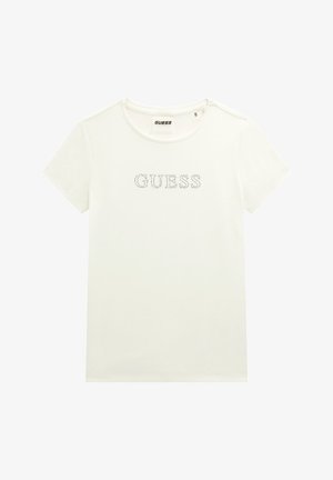 Biely tričko s krátkym rukávom vyrobené z bavlny s okrúhlym výstrihom a logom "GUESS" z krištáľov. Má jednoduchú, hladkú textúru.