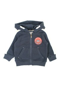 Sweat à capuche zippé bleu marine en tissu doux, avec un patch de logo rond, deux poches avant et des bandes blanches sur les épaules.