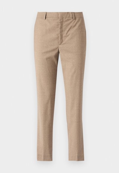 Beige-tailored housut, joissa on sileä rakenne, suorat lahkeet ja vetoketju. Edessä taskut ja hienovarainen herringbone-kuvio.