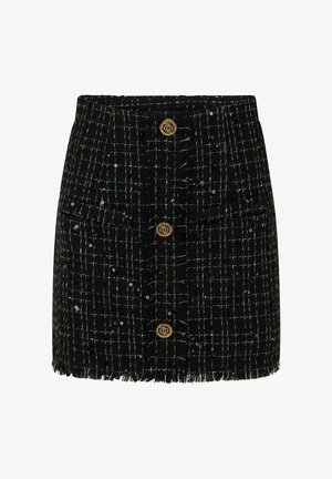 Gonna in tweed nera con motivo a quadri, due tasche frontali, orlo sfrangiato e bottoni dorati prominenti sul davanti.