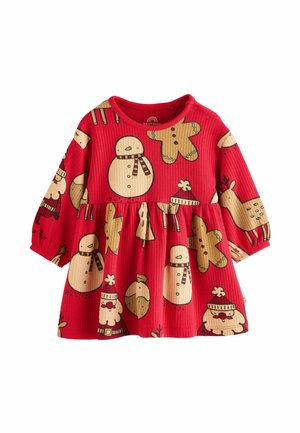 Rotes geripptes Kleid mit festlichen Mustern von Schneemännern, Rentieren und Lebkuchenfiguren. Lange Ärmel und ein gerafftes Rockdesign.