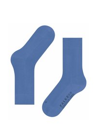 Chaussettes en coton bleu avec une texture lisse, dotées d'un orteil sans couture et d'un talon renforcé. Côté marqué "FALKE 35-38 COTON SENSIBLE."