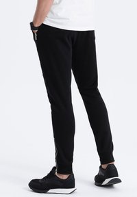Ombre Trainingsbroek - black