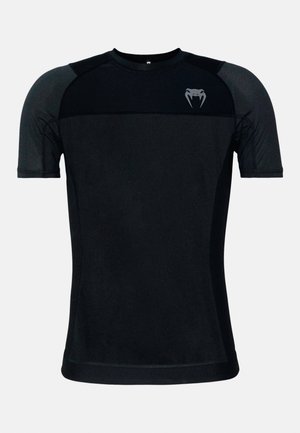 Black short-sleeve athletic shirt with a smooth fabric texture. Features a contrasting matte shoulder panel and a small logo on the chest.