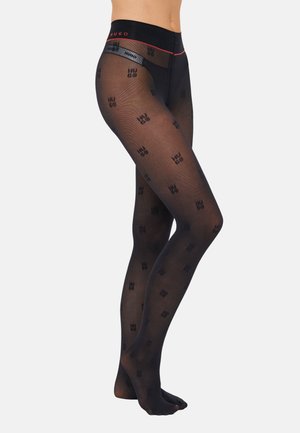 Black hosiery with an all-over logo pattern in dark gray. Features a black waistband with red and gray branding accents. Sheer texture.