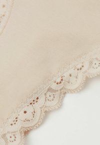 Intimissimi - Stringi