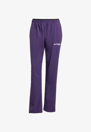 Purple athletic pants with a black elastic waistband, straight leg design, and a white "TERREX" logo on the left side. Smooth texture.