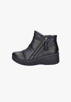 Black leather ankle boot with a zip closure, featuring a textured upper and a wedge sole for added height. Accented with a tassel detail.