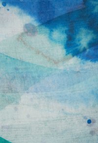 Abstract fabric featuring flowing textures in shades of blue and aqua, with subtle patterns and fine mesh-like weave.