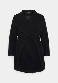 Manteau en laine mélangée noir avec un large col, ceinture à nouer, poches latérales et accents en cuir sur les manches. Coupe longue et décontractée.