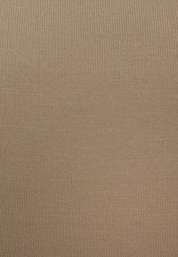 Beige ribbed fabric with fine vertical lines and a soft texture, creating a smooth appearance. Suitable for clothing or upholstery.