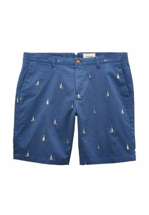 Blaue Baumwollshorts mit einem gestickten Leuchtturm-Muster in Weiß, Gelb und Schwarz. Mit vorderem Knopfverschluss und seitlichen Taschen.