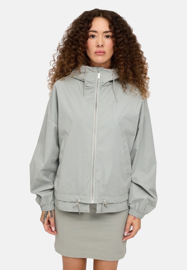Light gray hooded jacket with a zip front, elastic cuffs, and drawstring hem. Made of lightweight, smooth material, features minimal branding.