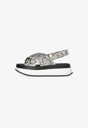 Sandalen met een nep slangprint in grijs en zwart, versierd met klare studs, een slingbackriem en een chunky witte en zwarte zool.