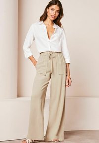 Lipsy WIDE - Auduma bikses - cream
