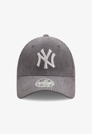 Gray corduroy cap with an adjustable strap, featuring a white embroidered logo on the front and a curved brim. Textured material detailing.