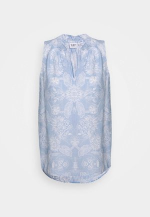 Sleeveless light blue blouse with white floral and leaf patterns, keyhole neckline, and slight gathers near the collar.