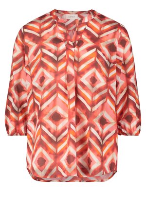 Bluse mit langen Ärmeln und geometrischem Rautenmuster in Rot-, Orange-, Weiß- und Brauntönen, mit rundem Ausschnitt und elastischen Bündchen.