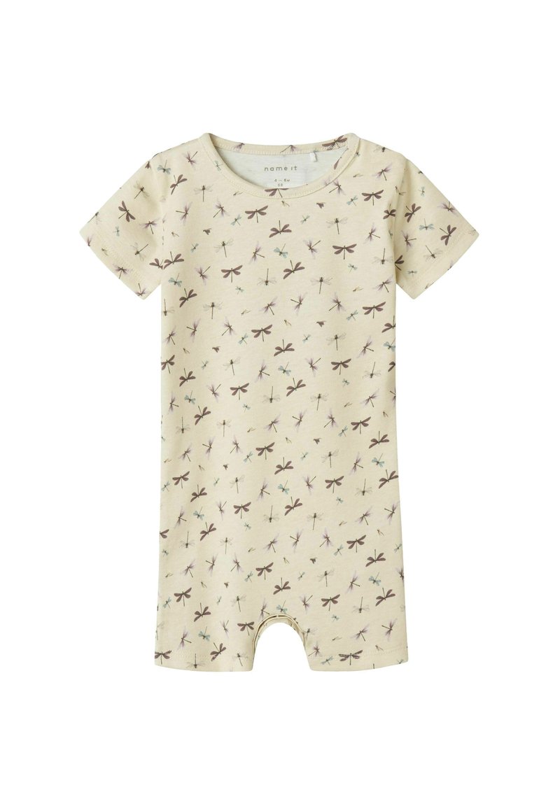 Combinaison à manches courtes en coton beige clair avec un motif de libellules en violet et bleu. Dotée d'un col rond et d'ouvertures pour les jambes.