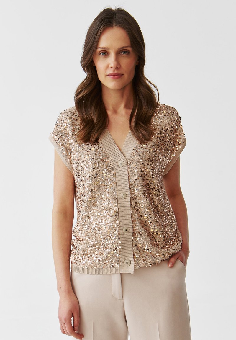 Short-sleeve, v-neck cardigan in light beige with scattered sequins and five-button front closure. Ribbed hem and sleeve edges.