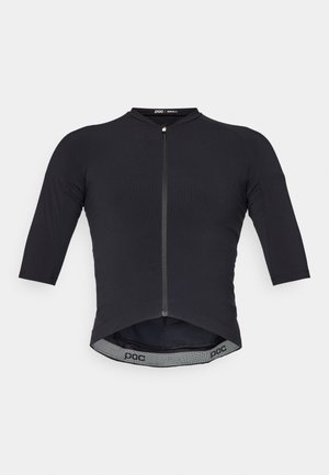 Black cycling jersey with 3/4 sleeves, front zipper, ribbed texture, and curved hem. Features POC logo on the inside waistband.