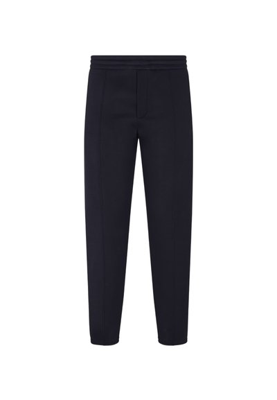 Marineblau tapered Jogginghosen aus einem weichen Stoff mit breitem elastischen Bund, ausgestattet mit kontrastierenden Nähten und einem Detail mit vorderer Tasche.