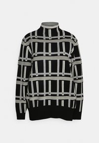 Pull à col roulé à manches longues noir et gris avec un motif en grille. Comprend des rayures alternées et des blocs solides pour ajouter de la texture.