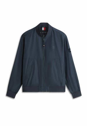 Marineblauwe bomberjack met rits aan de voorkant, zijzakken, geribbelde kraag en manchetten, en subtiel Tommy Hilfiger-logo op de borst en mouw.