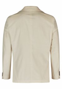 Helle beigefarbene Jacke mit glatter Textur, aufgesetztem Revers und drei Viertelärmeln. Besitzt vertikale Streifen und dunkle Knopfakzente.