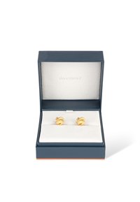 Gold knot-shaped earrings displayed in a navy box with a white interior and a soft cushioning base. "DAVIDOFF" printed inside the lid.