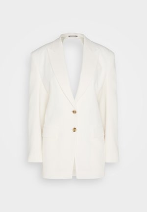 White blazer with a classic design, peak lapels, two front pockets, two gold buttons, and a deep V-neckline. Smooth, structured fabric.