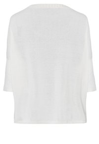 White knitted top with short sleeves, open back, and a ribbed neckline. Soft texture, loose fit, and minimalistic design without patterns.
