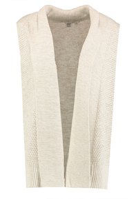 Öppen framskjutande väst i mjukt krämfärgad stickning. Har ribbade detaljer, texturerade mönster på sidorna och en bred sjalkrage.