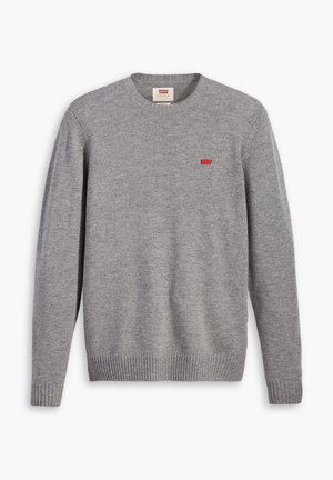 Sweatshirt gris en matériau doux avec un col rond, des poignets et un ourlet côtelés. Présente un petit logo rouge sur la poitrine.
