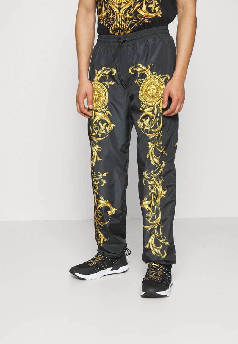 pantaloni versace