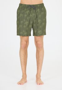 Gröna badshorts med palmträdsmönster, elastisk midja och justerbar dragsko. Tillverkade av lätt och snabbtorkande tyg.
