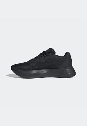Black athletic sneaker with mesh upper, lace-up closure, and thick cushioned sole shown in left profile on white background.