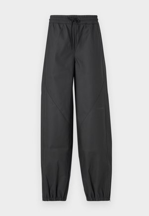 Black, loose-fitting athletic pants with an elastic waistband and drawstring. Features tapered cuffs and flat seams for a smooth finish.