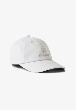 White cotton baseball cap with curved brim, featuring embroidered "B" logo and "FIRE+ICE" text on front panel.