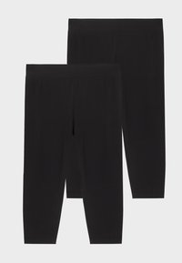 Dva páry čiernych legín až po kolená s elastickým pásom, zobrazené na svetlom pozadí.