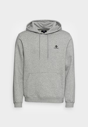 Sweat à capuche gris clair avec poche avant, cordons et petit logo Converse noir sur la poitrine gauche.