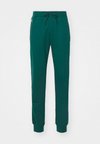 ICONS CUFF PANTS - Pantaloni sportivi - green