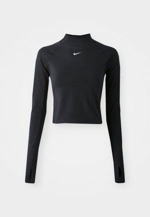 Zwarte lange mouwen crop top van rekbare stof, met een hoge hals, een strak ontwerp en een klein wit Nike-logo op de borst.