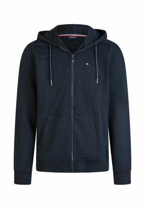 Marineblauwe hoodie met rits, trekkoorden, zakken aan de voorkant, geribbelde manchetten en een klein rood-wit-blauw logo op de linkerborst.